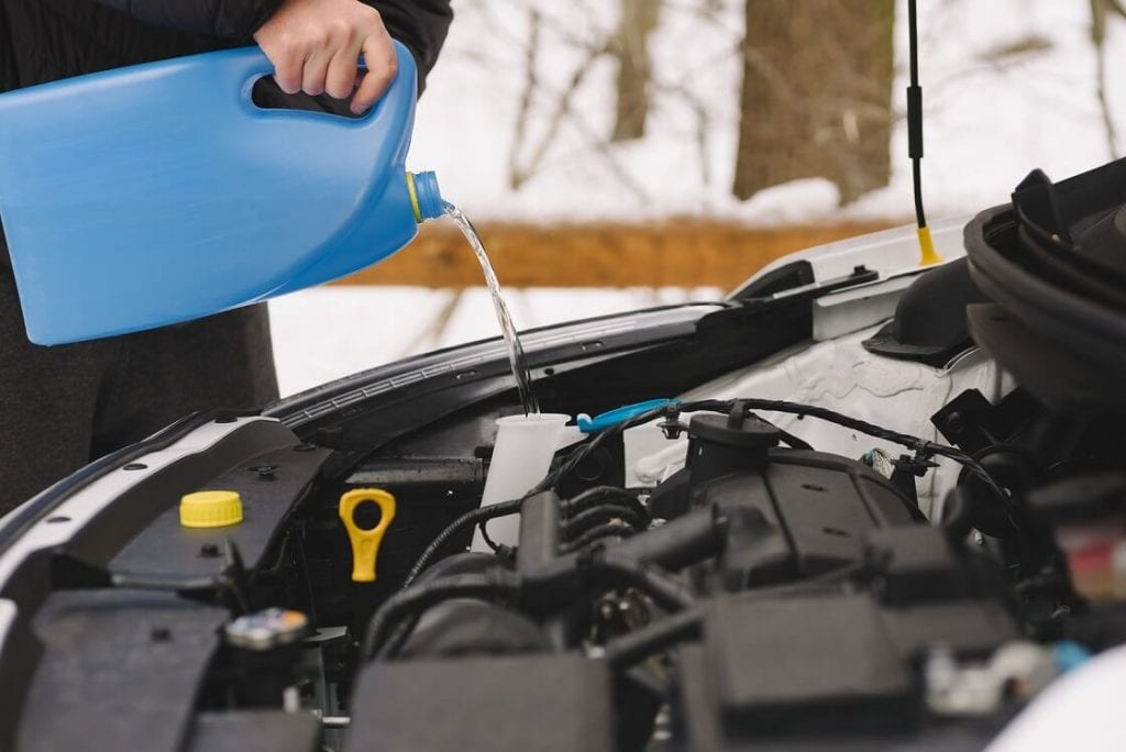 Car filling up with screen wash | 1 Dog At a Time Rescue UK