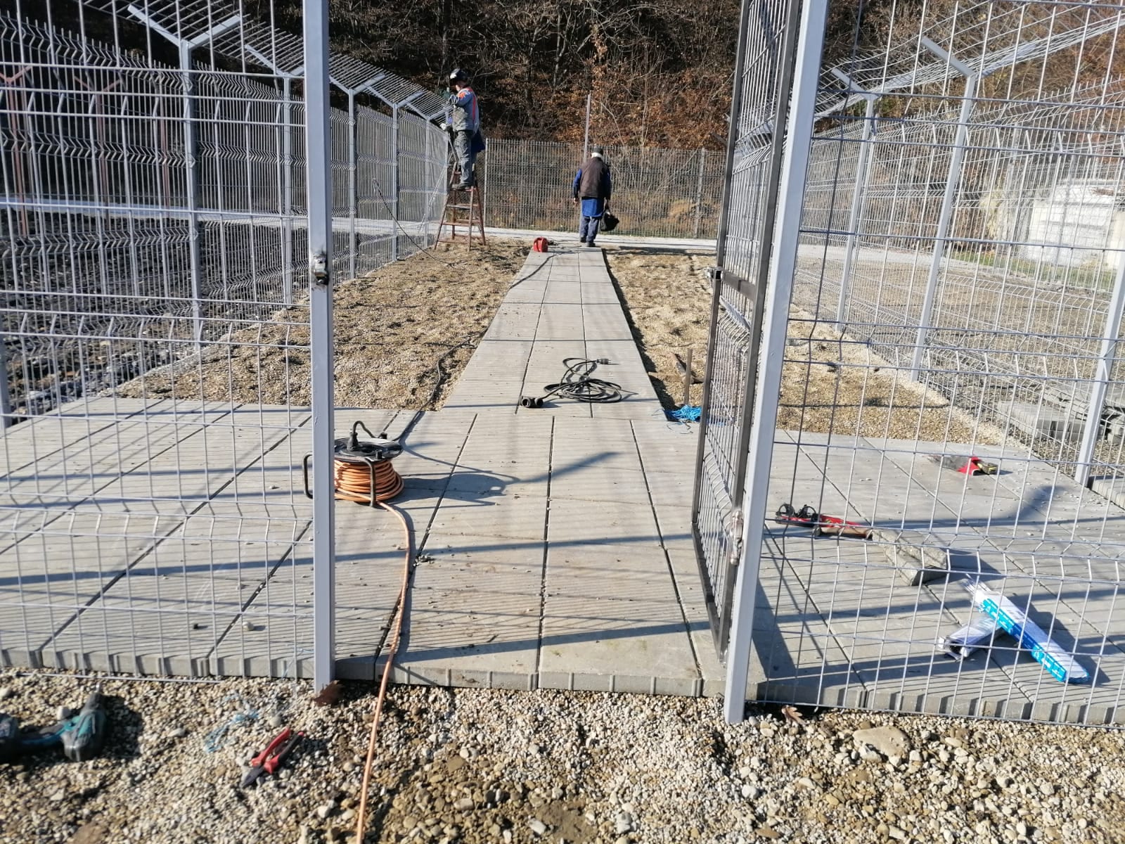 Outdoor runs laying floor Outdoor kennels paving slabs at Happys | 1 Dog At a Time Rescue UK